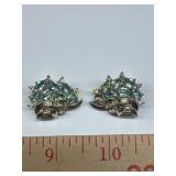 Trifari clip-on earrings with missing stones