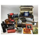 Binoculars, books, scale, foot stool