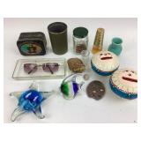 Art glass, piggy banks, tin, and decorative items