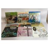 12 vinyl records with covers