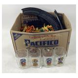 Toy train track pieces and character glassware