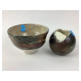 Stoneware pottery with metallic glaze signed