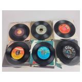 Assorted 45 RPM Vinyl Records with Sleeves