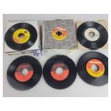 Assorted 45 RPM Records with Sleeves