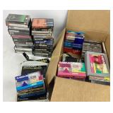 Collection of cassette tapes and new blank cassett