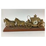 Horse and carriage clock figurine on wood base