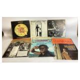 12 Vinyl Records with Worn Covers