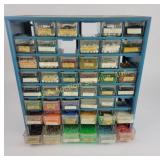 Metal storage cabinet with assorted beads