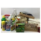 Mixed household cleaning supplies, glassware, fabr