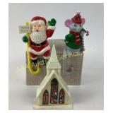 Christmas dï¿½cor with Santa, mouse, and church