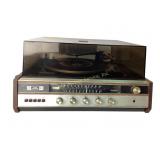 The Fisher 35 Record player stereo, turns
