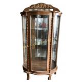 Curio cabinet with mirror back, light at the