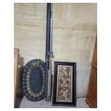 Metal wall tray, framed art, plastic desk chair