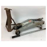 Hydraulic jack and rusted jack. hydraulic jack