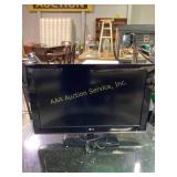 LG 31 inch TV, powers on, no remote