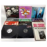 Vinyl records: Care Bears, Simon and Garfunkel,