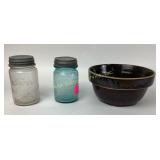 Crock bowl with two ball jars in zink lids all in