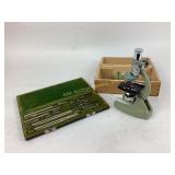 Pilot Drafting instruments in case, microscope in