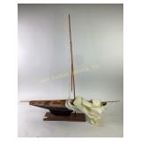 Decorative wooden sail boat with sail, needs