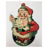 Lg cardstock mechanical Santa w/rotating feet and