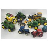 John Deere plastic toy tractors, CAT plastic