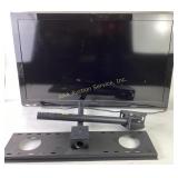 Panasonic HDTV with mounting brackets, powers on