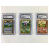Graded Pokemon Cards Including Butterfree and Char