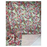 Quilt with watercolor patterned design and b