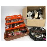 Plastic toolbox filled with assorted hardware,