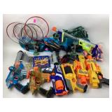 Nerf Guns and ammo, skateboard, badminton