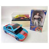NASCAR Memorabilia with Figures, Cars, and Display