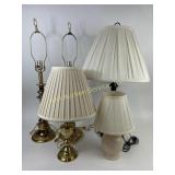 Table lamps: brass toned, matte black and peach