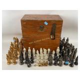 Chrome glazed ceramic chess pieces.