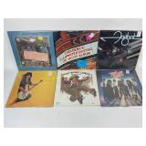 Vinyl records in protective sleeve: CCR,