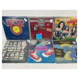 Vinyl records in protective plastic sleeve:
