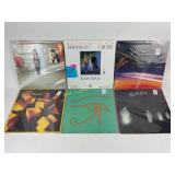 Vinyl records in protective plastic sleeve: Rain