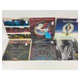 Vinyl records in protective plastic sleeve: