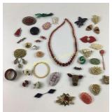 Costume jewelry Art Deco celluloid brooches,