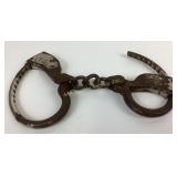 Late 19th century Tower handcuffs no key