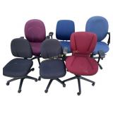 Six rolling office chairs - assorted colors,