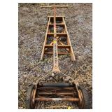 Silent yard man reel mower, wooden ladder