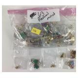 63 pairs of pierced earrings