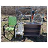 Metal shelving.  Box fan on stand.  Outdoor patio