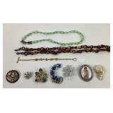 Costumes jewelry: Blue swoosh brooch, mellifiori