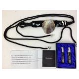 Shell and rope belt.  Boxed set of vials of