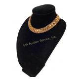 Burnt Orange rhinestone like and gold toned