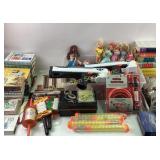 Barbie Dolls, Toy Guns, Books, and Craft Supplies