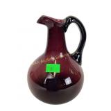 Early amethyst glass jug