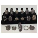 Rings:  silver tone in various sizes and styles,