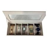 Watches:  black rhinestone, gold bracelet